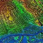 LiDAR sample of an urban area with height information conveyed by a spectrum of red, green and blue colours.