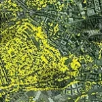 Aerial photography of an urban area showing Bluesky's National Tree Map data overlaid to highlight tree canopies