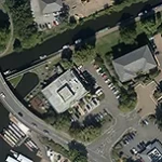 5cm resolution aerial photograph of a building near a road and waterway.