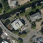 5cm resolution aerial photograph of a building near a road and waterway.