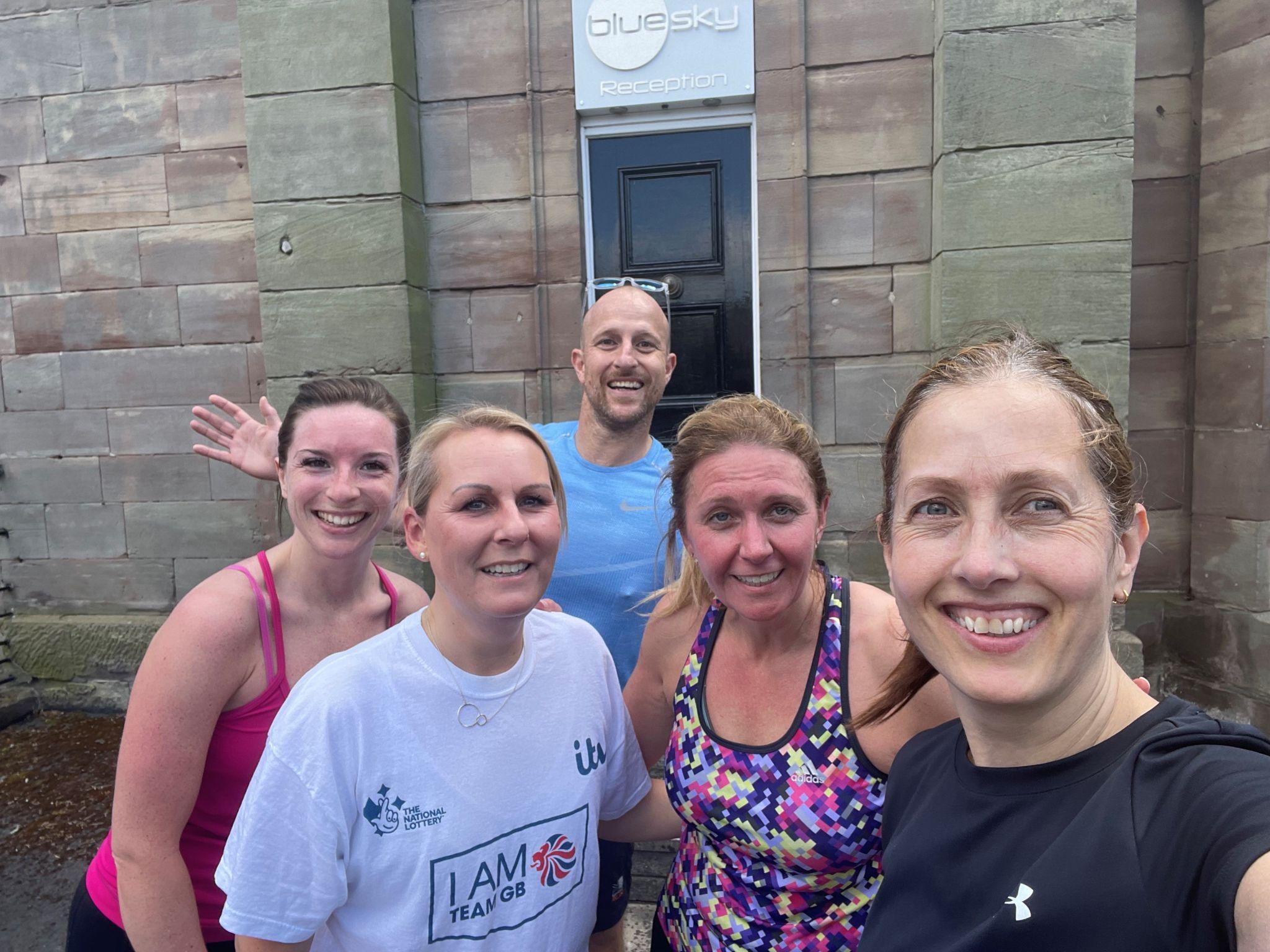 Bluesky colleagues outside head office after a lunchtime run