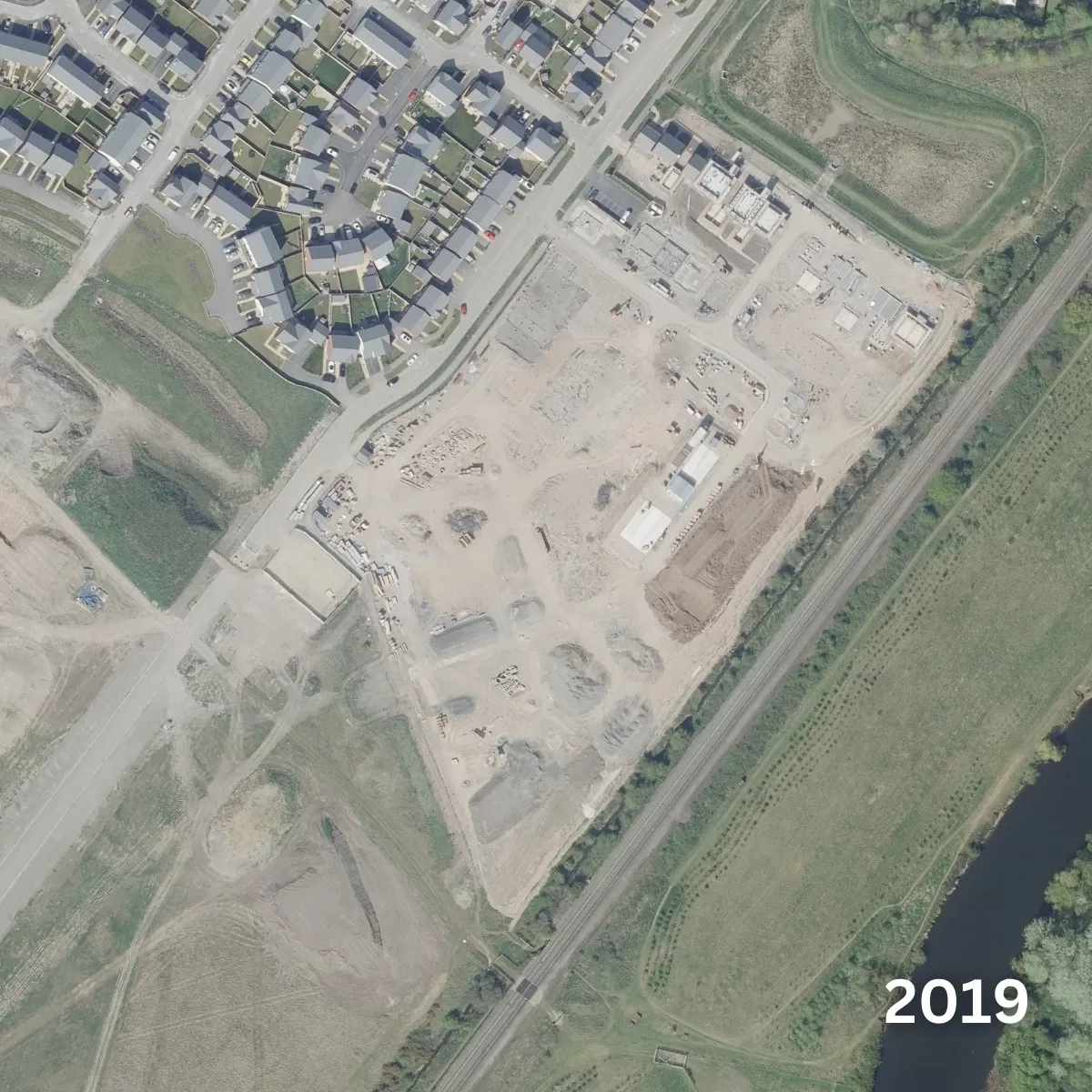 Image of green land in 2019 with development taking place